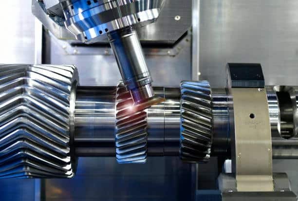 Gear turning and finishing operation on CNC machine to create precision gear teeth