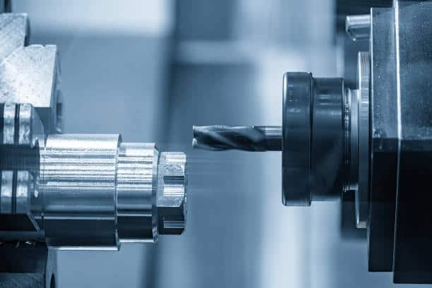 Parting process in lathe machining cutting off the finished component from the stock material