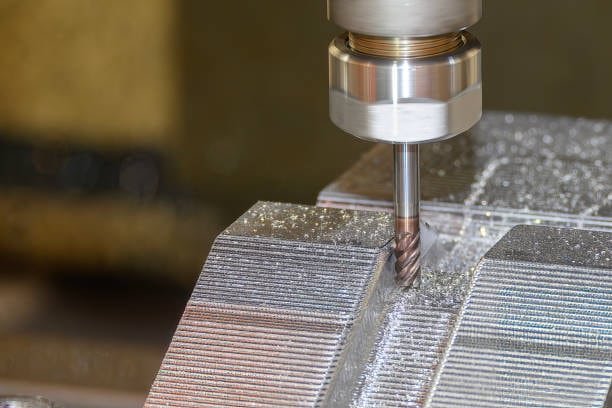 End milling process on a stepped metal surface for creating precise grooves