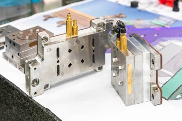 Precision molds designed for use in both injection molding and compression molding processes.