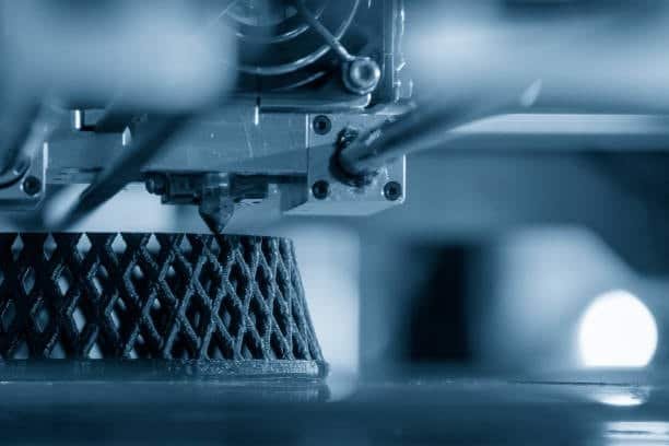 Close-up of FDM 3D printer printing a lattice structure
