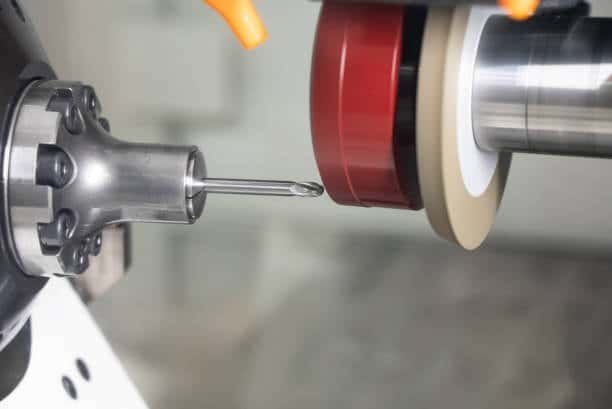 Close-up of a CNC tool sharpening machine ensuring cutting edge accuracy for dynamic machining