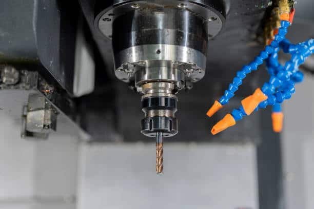 Spindle of a CNC machining center equipped with a high-precision drill bit
