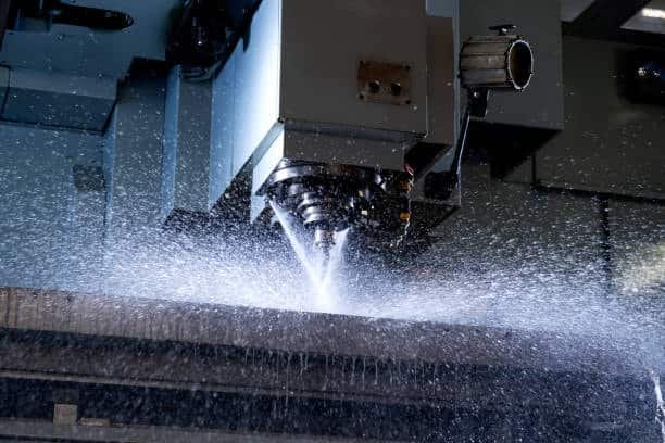 CNC spindle releasing coolant aggressively during high-speed milling, a situation prone to chatter