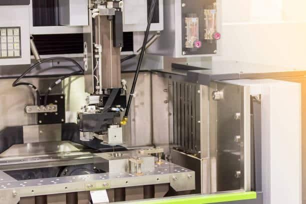 EDM wire machine with automated setup for precision machining