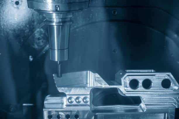 CNC tool machining aluminum part with complex contours and clean finish