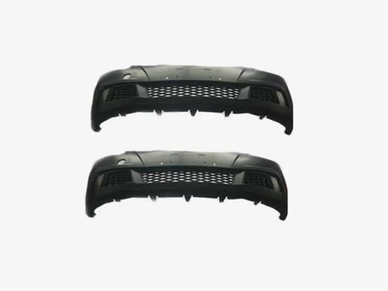Two black injection-molded plastic automotive bumpers shown front-facing on a white background.