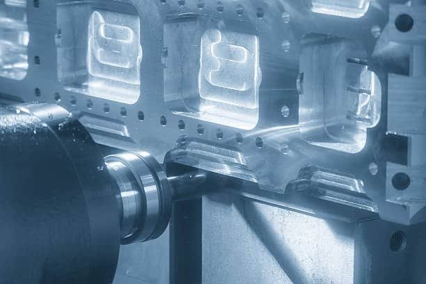 CNC tool finishing internal geometry of engine block with accurate roughness