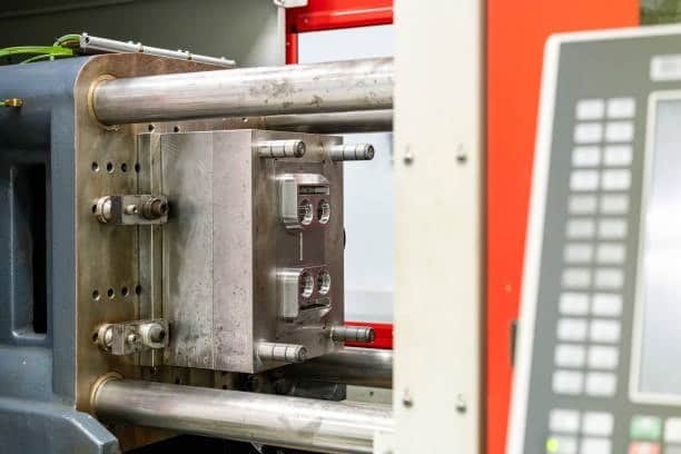 Plastic mold base fixed inside injection molding machine with runner layout
