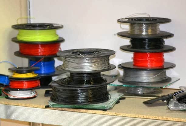Assorted colored PLA filament rolls for injection molding applications