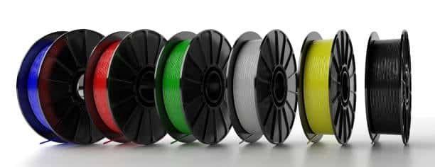 PLA filament spools in multiple colors for diverse injection molding needs