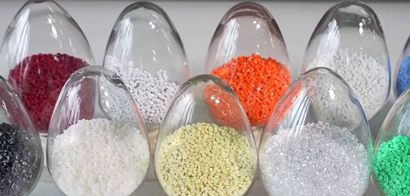 Polypropylene resin samples in lab test tubes for safety and food-grade certification testing