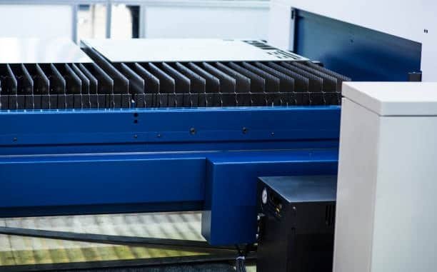 Laser cutting equipment used for sheet preparation in ABS plastic processing
