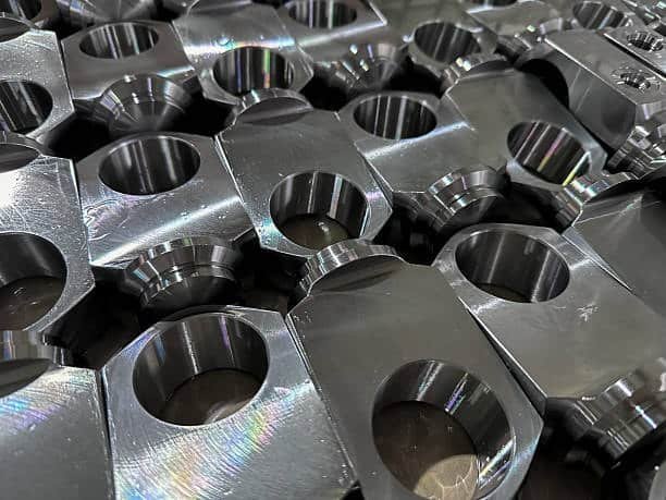 Group of precision metal components manufactured through short-run CNC machining