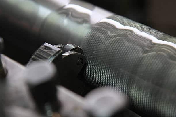 Filament winding machine forming a carbon fiber cylindrical structure