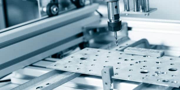 CNC fixture plate with multiple holes designed for component positioning and modular setups