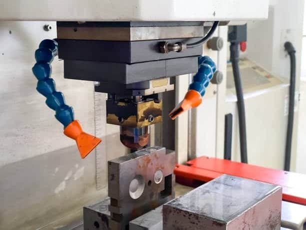 Close-up view of jig tooling setup on a CNC machine