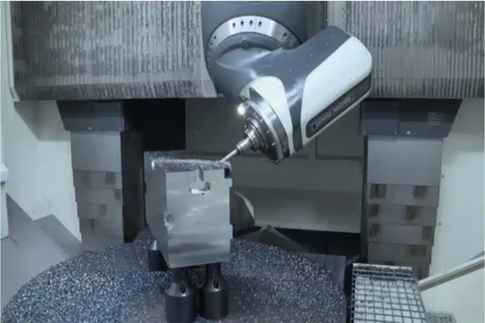 CNC machining process showing a high-precision metal part being cut with a 5-axis CNC machine.
