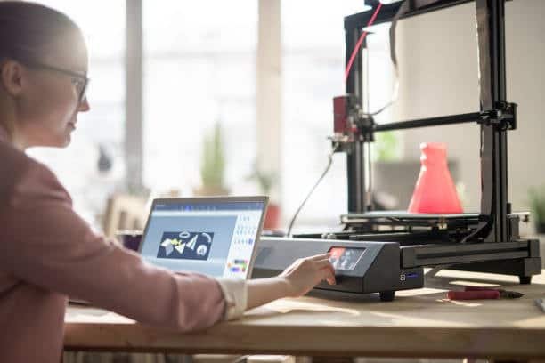 3D printer creating a dental model layer by layer