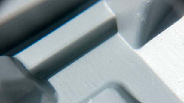 Close-up of fine surface detail on an injection molded component