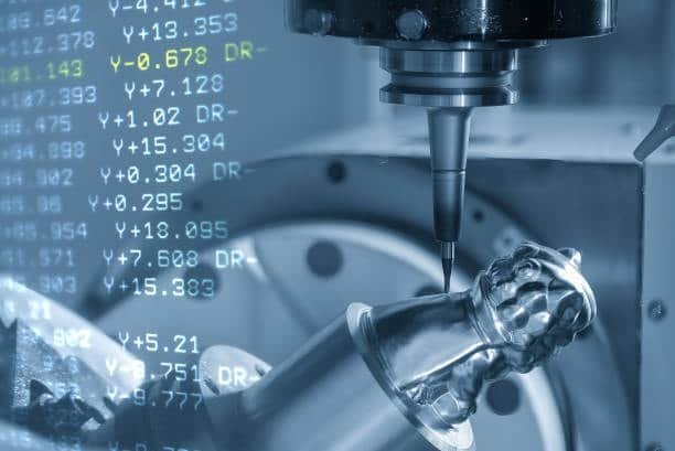 Advanced five-axis CNC milling head working on a detailed part, showing active G-Code commands like X, Y, Z, and feed rate