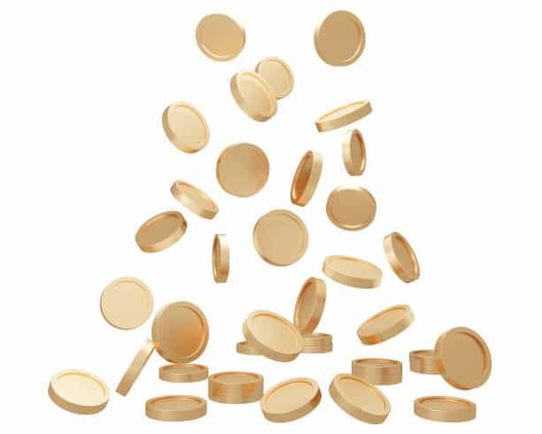BPA-free golden TPE discs in motion, illustrating the versatility of non-toxic thermoplastic elastomers.