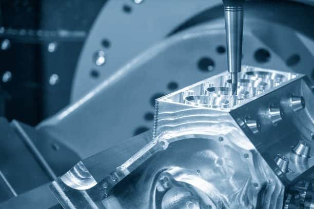 High-precision Swiss CNC machine cutting a complex metal component