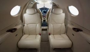 Aerospace aircraft interior, showcasing the use of high-performance injection molded parts for cockpit components and seating.