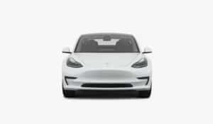 White car front view, representing the use of automotive injection molding for lightweight, high-strength components.