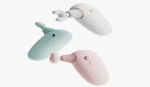 Three pastel-colored handheld electronic device housings produced by precision injection molding for consumer electronics.