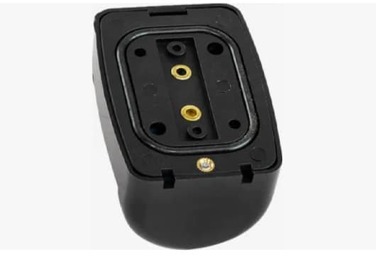Plastic housing with embedded metal inserts produced by insert molding, used for electrical connector applications.