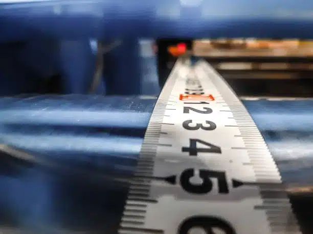 Detailed view of measuring tape for checking press fit dimensions