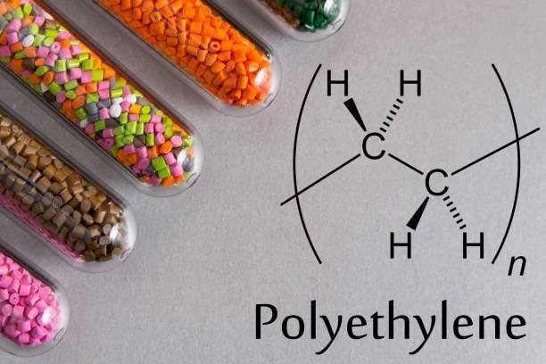 Polyethylene resin pellets with chemical bonds diagram relevant to POM vs Delrin analysis