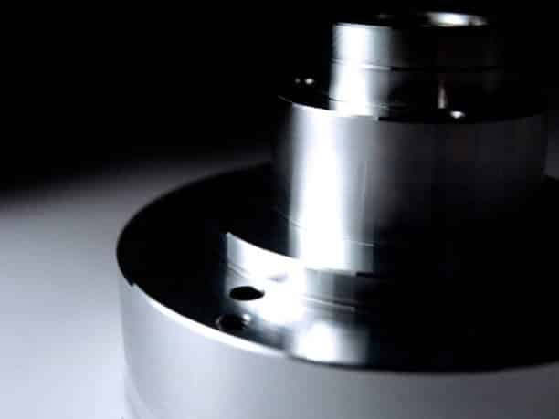 Machined cylindrical housing for mechanical components made in low quantity