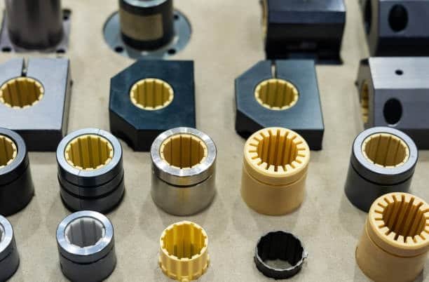 Precision injection molded components with varying surface finish levels