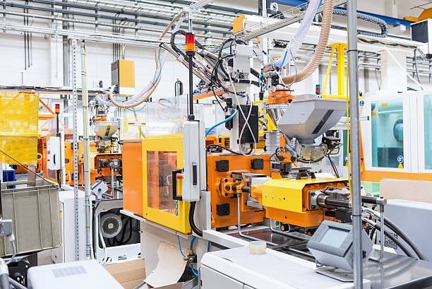 Precision injection molding equipment at ZCS Mould for cost savings.