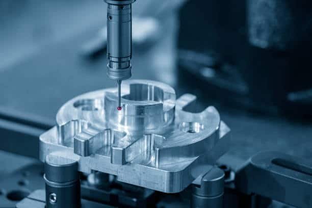 Coordinate measuring machine inspecting milled part for accuracy