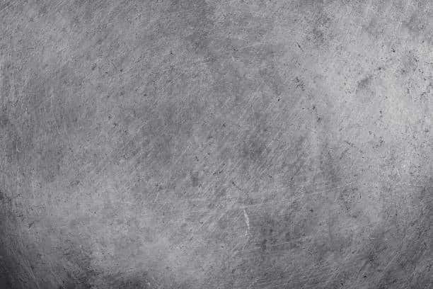 Cold work mold steel surface with visible wear and machining marks
