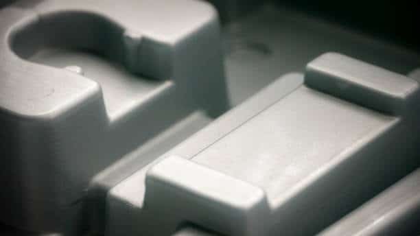 Satin finish on an injection molded plastic part for smooth and semi-gloss texture