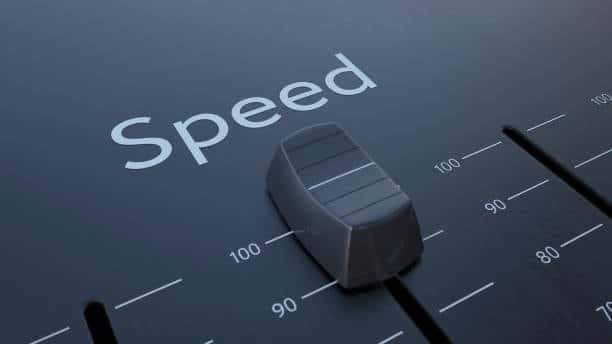Close-up of a speed control dial used to adjust cutting speed in CNC machinery