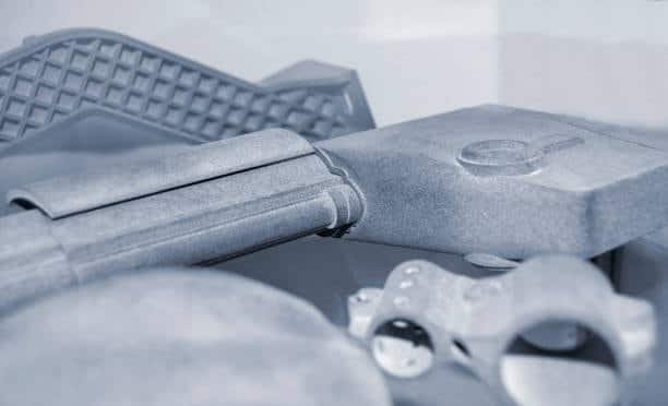 Injection molded part with textured surface finish for grip and matte appearance