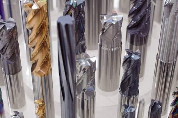 Assorted end mills and milling tools used in precision CNC milling