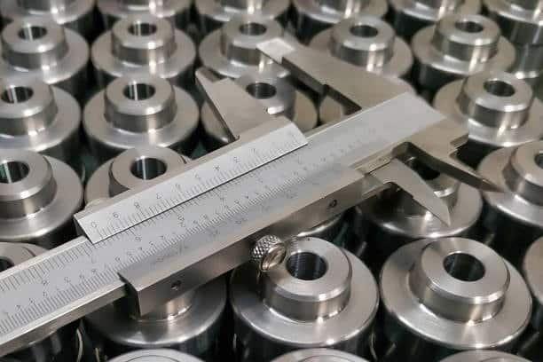 Machined precision metal fittings with strict tolerance quality control