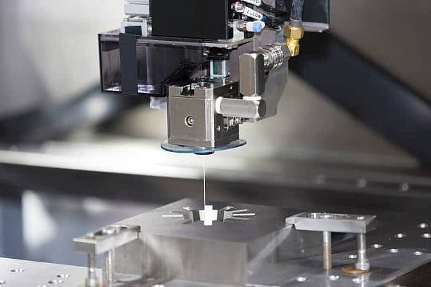 Wire EDM machine using jig fixture for precision profile cutting
