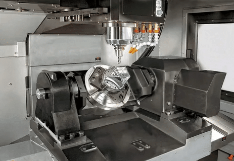 5-axis CNC machine rotating and cutting metal workpiece for full-surface coverage.