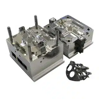 Mold set for an automotive component with plastic prototype shown alongside