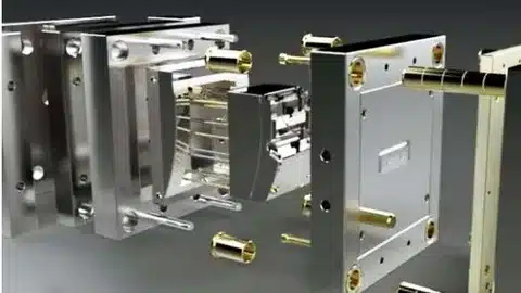 Detailed exploded CAD model of plastic injection mold showing parting lines and ejectors