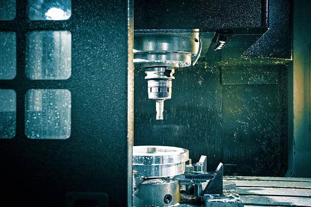 Interior view of CNC cutting process for medical-grade metal parts