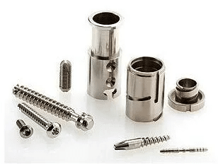 Assorted CNC-machined implant-grade metal parts for surgical applications
