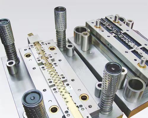 High-precision custom stamping dies featuring multiple guide pillars and machined steel components on a neutral background.